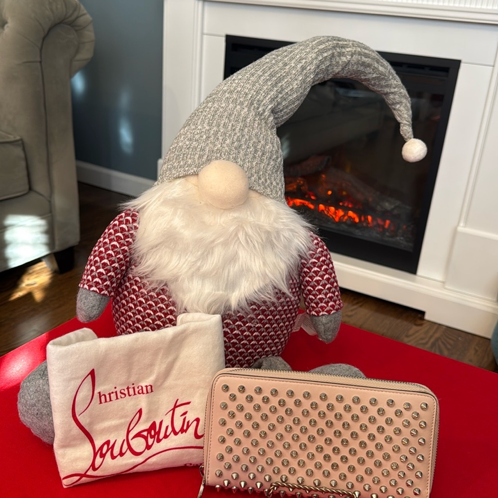 Christian Louboutin panettone spike leather zip around long wallet.